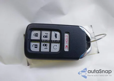 2022 Honda Odyssey Touring z USA, uszkodzony, nr VIN 5FNRL6H86NB067383